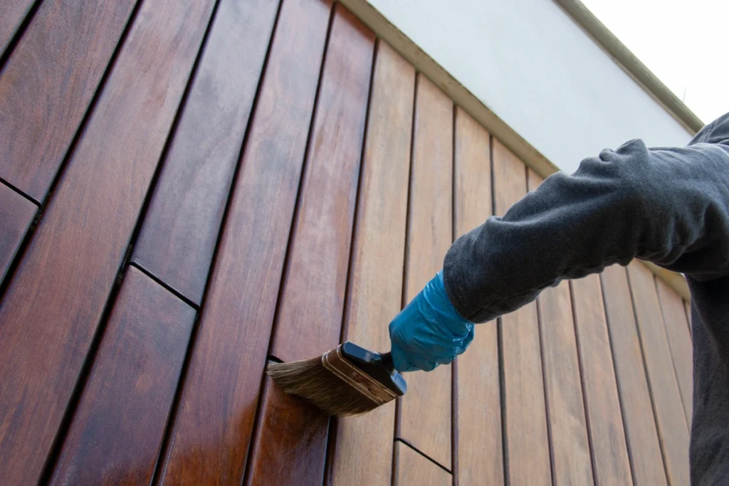 waterproof paint coverage on wooden siding panels