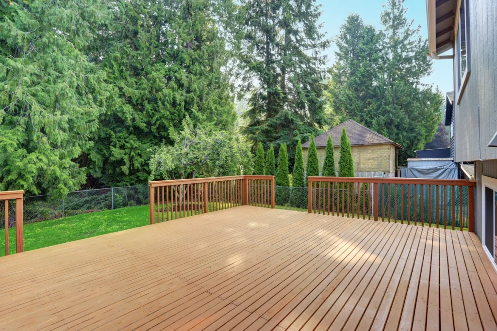 decks gresham-new brown wooded deck with a fenced backyard