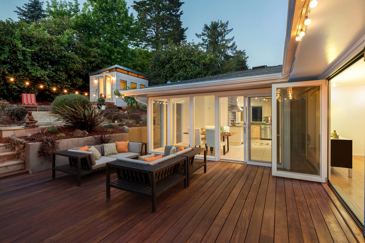 decks lake oswego-new decking off the house with outdoor lighting and furniture