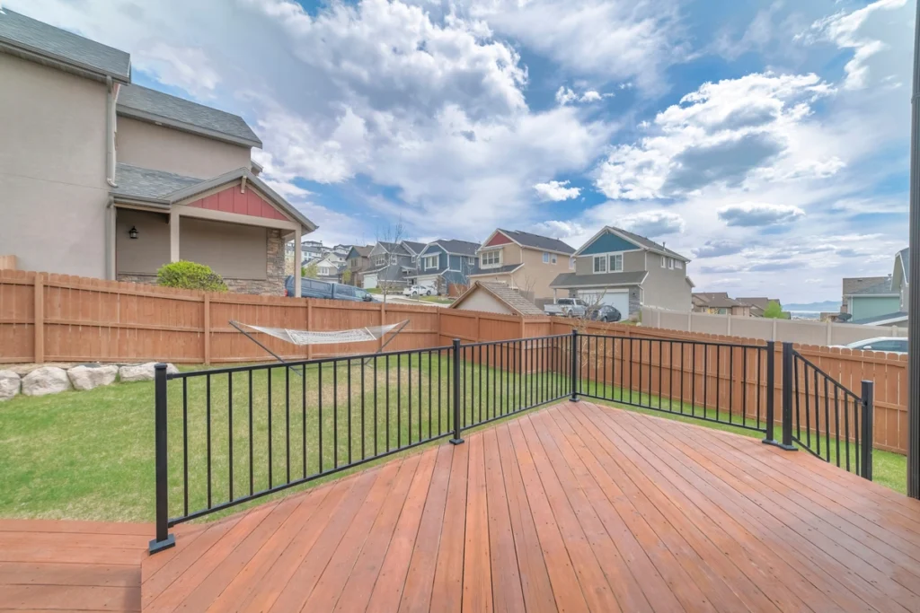 decks molalla-wood decking with metal railing overlooking a backyard and neighborhood