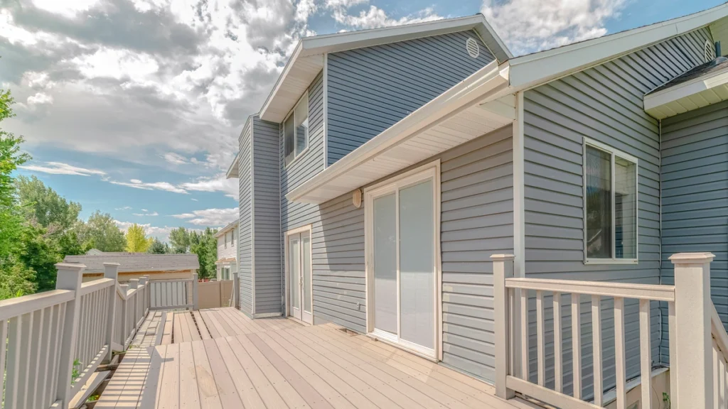 decks west linn-blue sided house with light wood decking