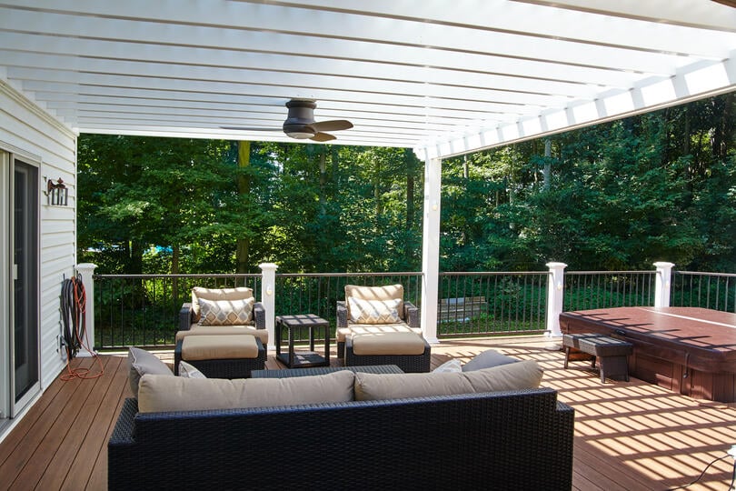 composite wood-finished composite deck with outdoor furniture
