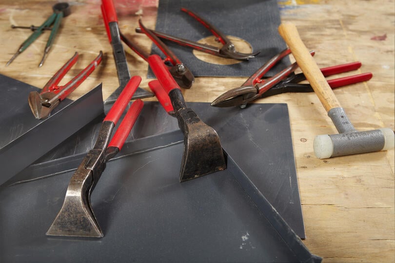 roofing tools-pile of roofing tools on roof decking