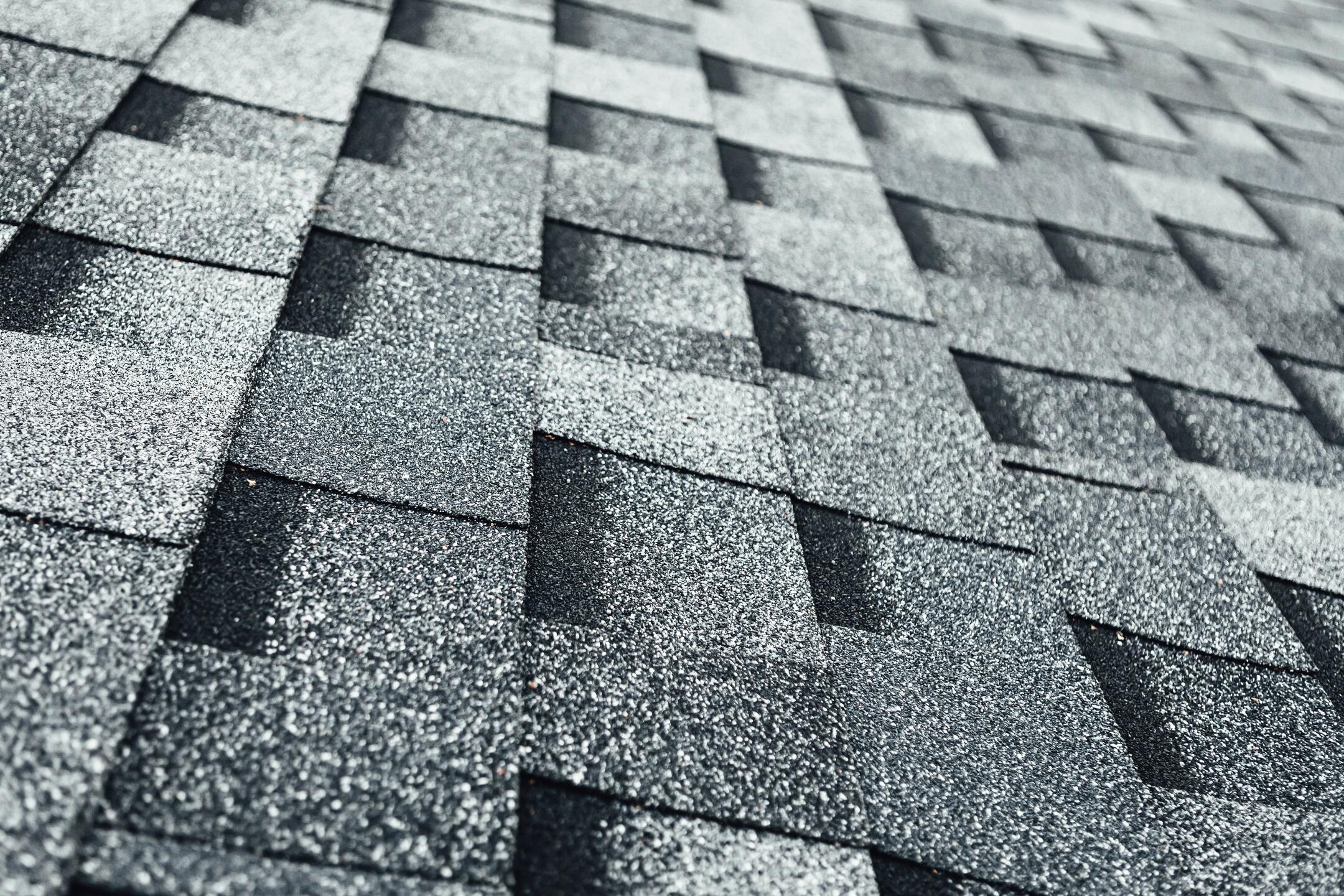 cost of metal roof vs shingle-close up image of gray shingles