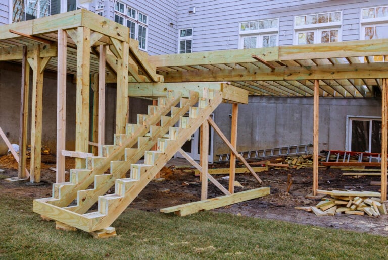 how to build a deck-a deck being built off a house in progress