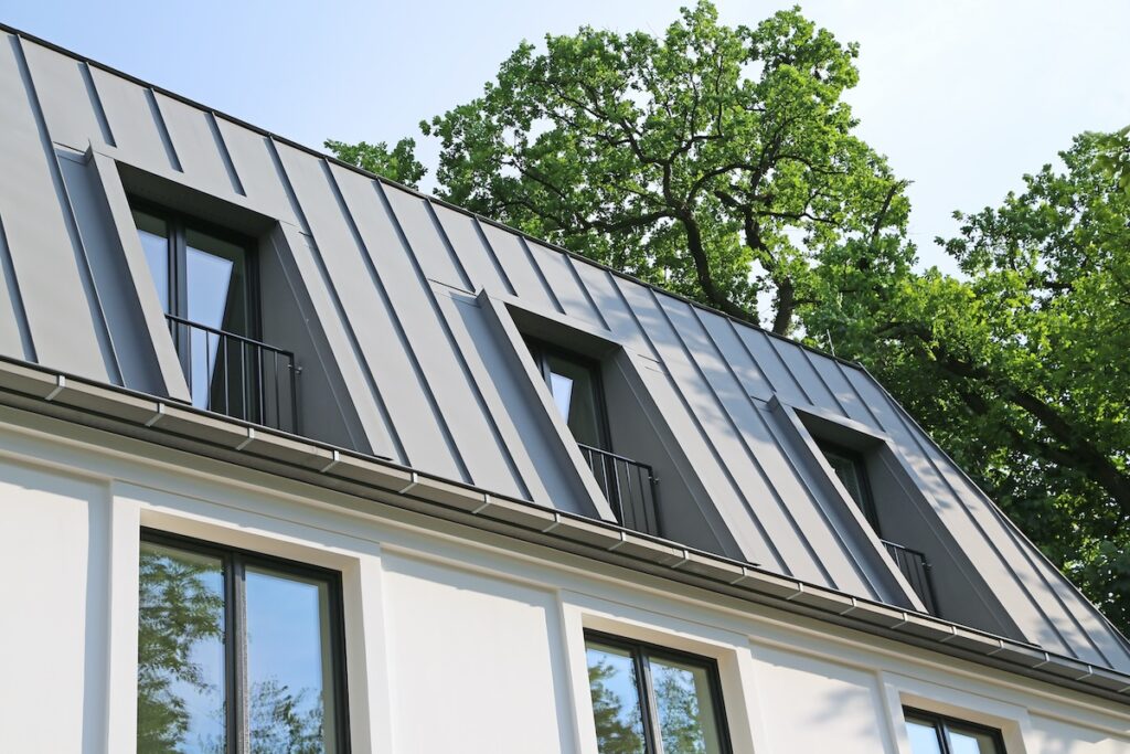 white house gray standing seam metal roof