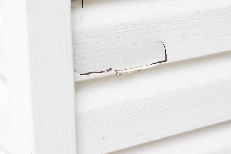 Cracked siding from storm damage