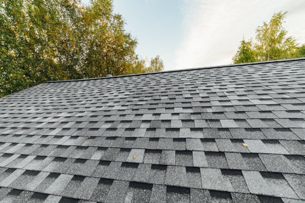 new renovated roof covered with impact resistant shingles
