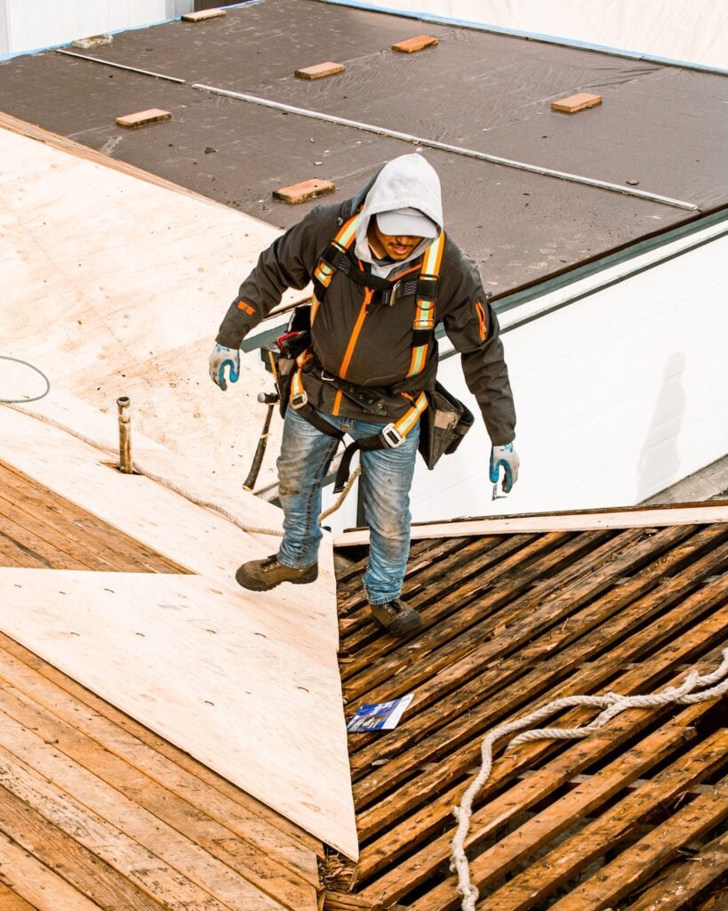 employee standing on roof