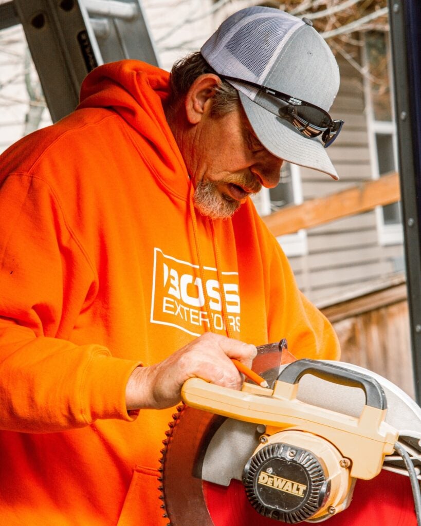 Boss exteriors employee working
