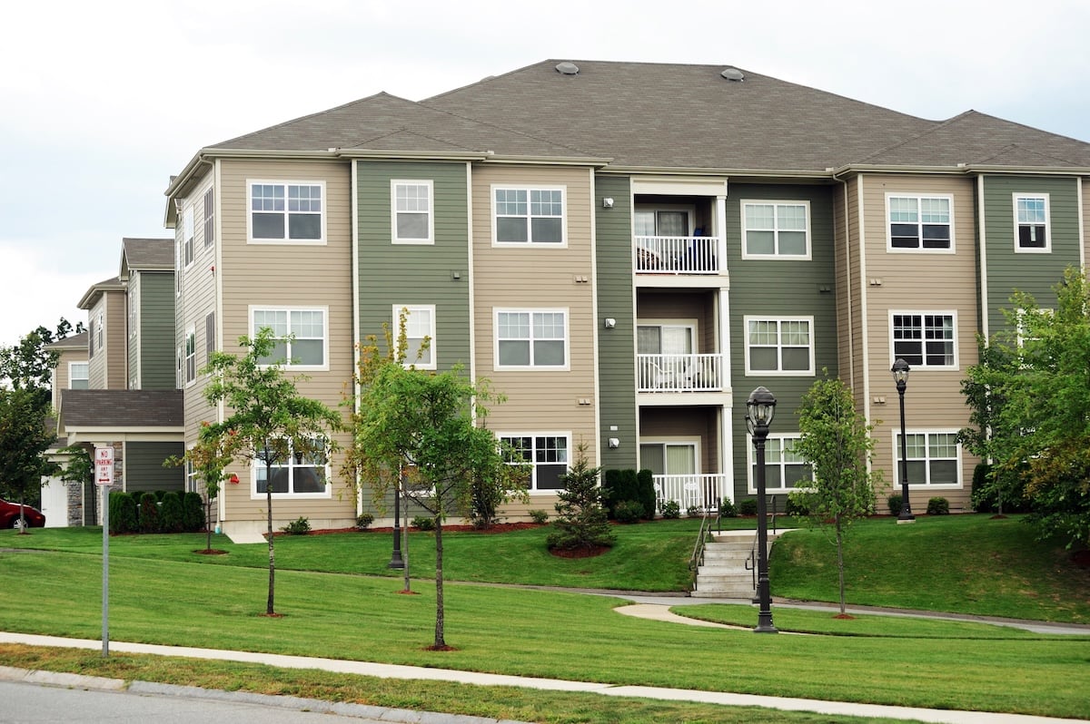 apartment building with new roof and siding