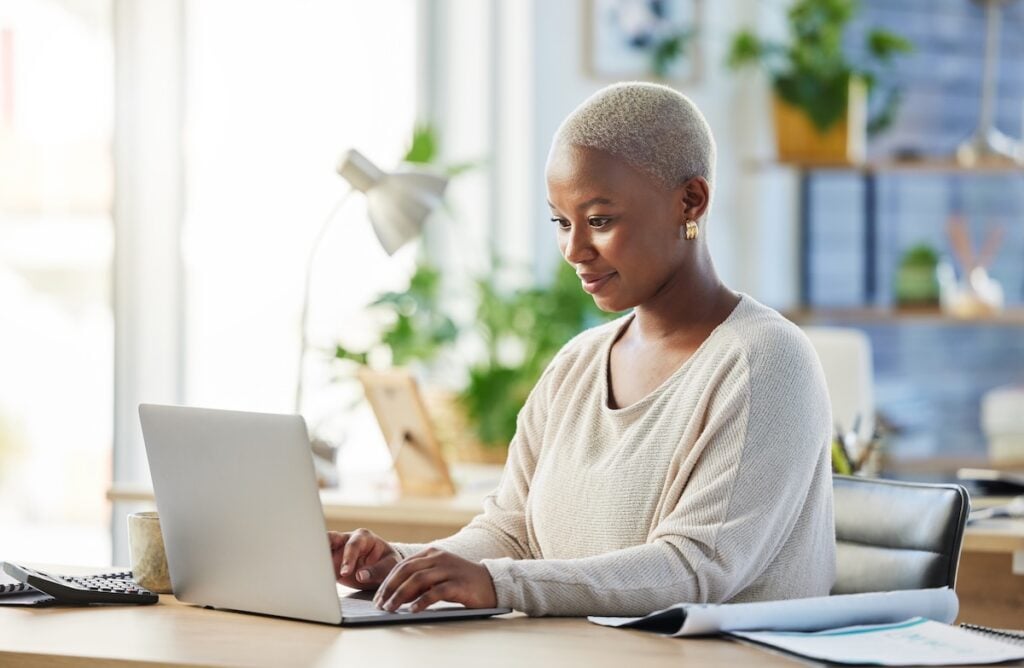 woman researching contractors on computer
