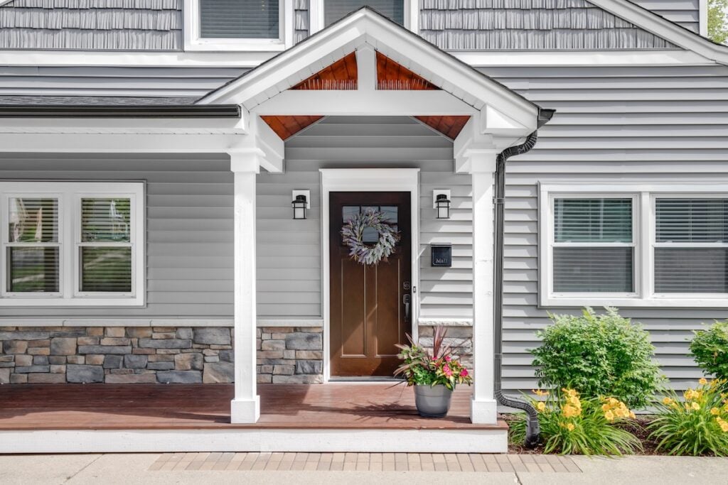 Vinyl siding on house by front door