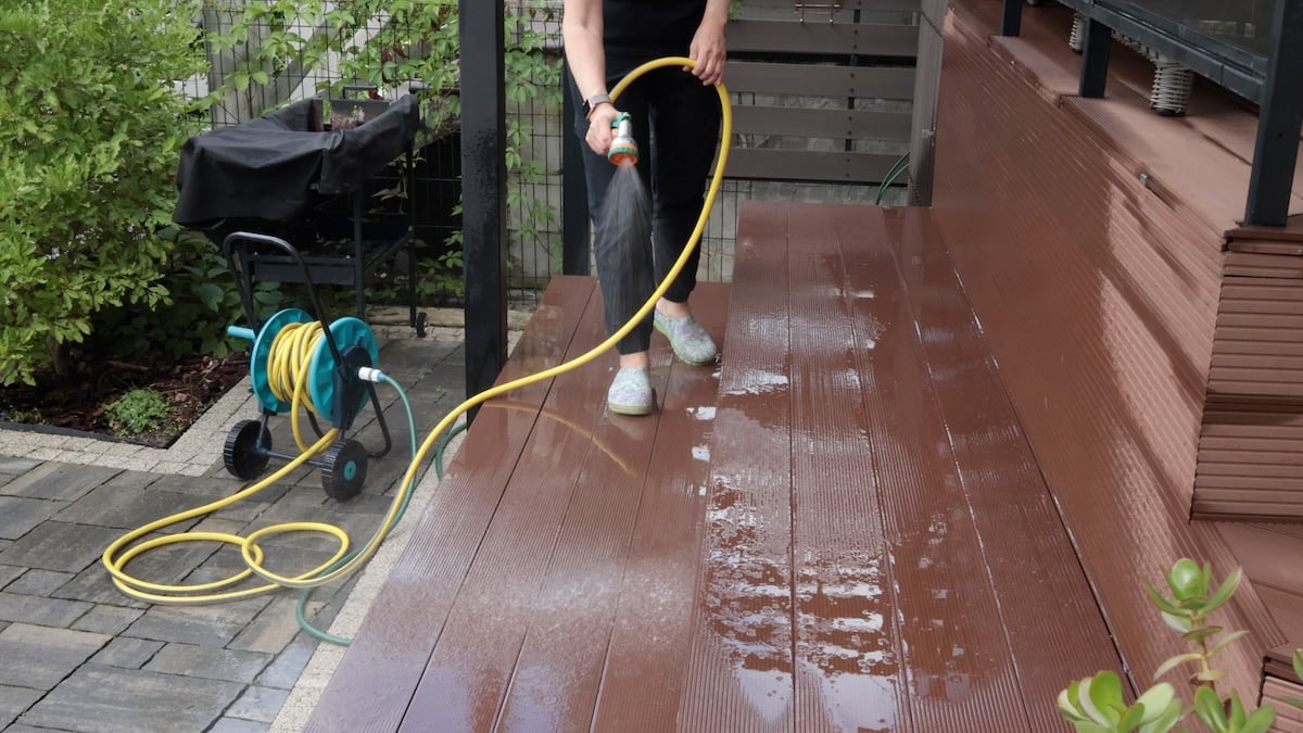 washing deck with hose